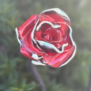 Kvet “divá ruža” červeno-tyrkysový